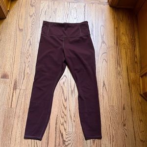 Super comfy maroon Athleta leggings. Cute mesh hole design. Make me an offer!